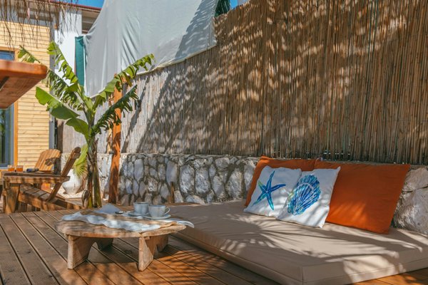 How can families save money on theme park tickets in the UK?